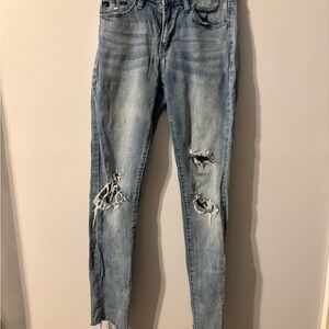 174J Women's Light Blue Distressed Skinny Jeans raw edge